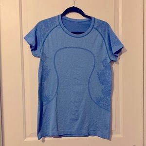 Blue Lulu T shirt with flower side detail